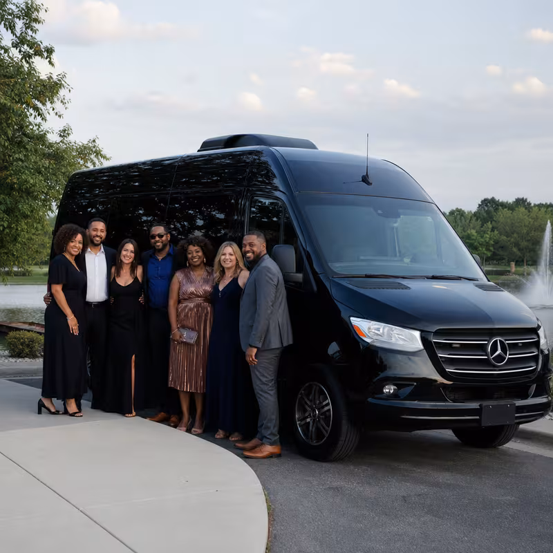 Group beside a Mercedes Sprinter limo from the Sterling Heights fleet