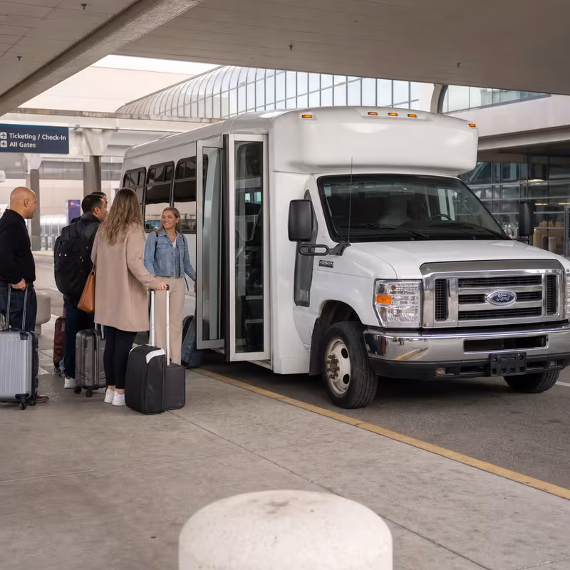 Black Mercedes Sprinter van staged for an Sterling Heights Airport Transportation group