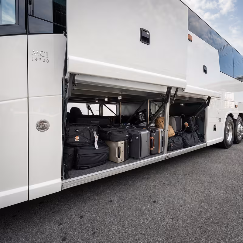 Party bus interior with wraparound leather seating and LED lighting in Sterling Heights