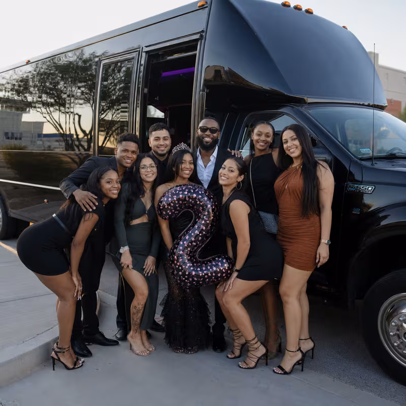 Party bus interior with wraparound leather seating and LED lighting in Sterling Heights
